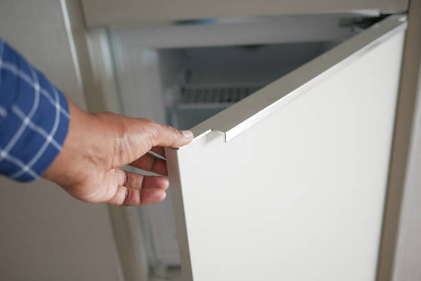 istock men hand open fridge door 1840606215