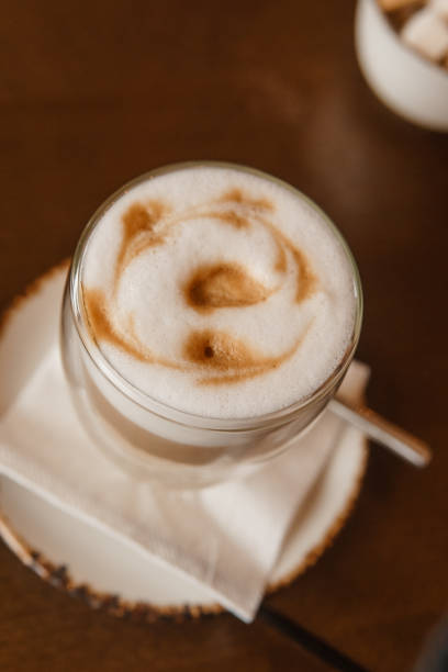 istock Delicious coffee Lattes in a glass cup on a table 1840623437