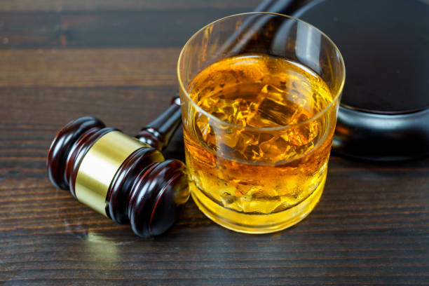 istock Judge gavel and whisky, alcohol and crimes concept 1840626023