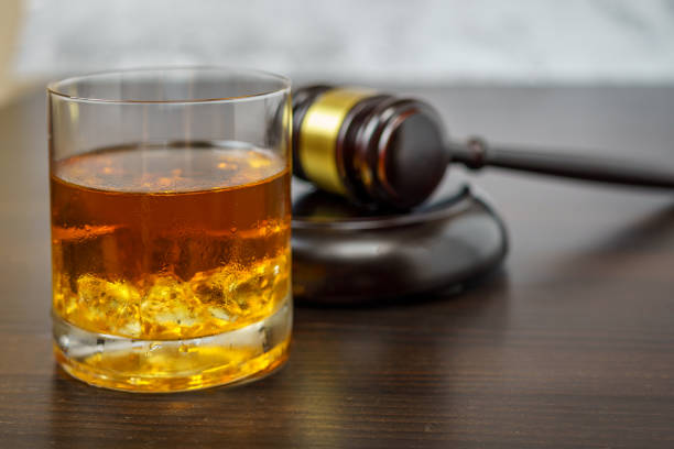 istock Judge gavel and whisky, alcohol and crimes concept 1840626024