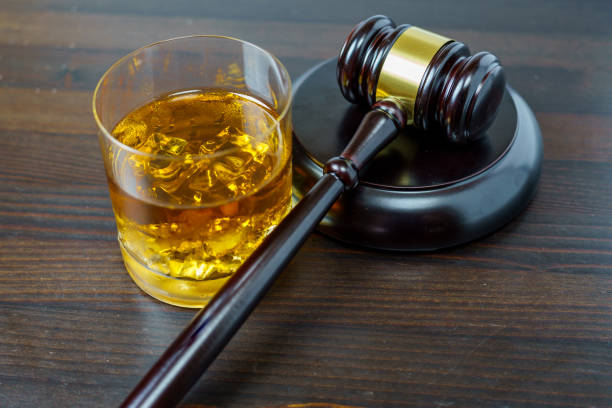 istock Judge gavel and whisky, alcohol and crimes concept 1840626025