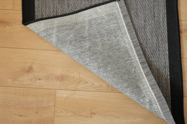 istock Seamless grey carpet texture background on wooden floor with copy space 1840633948