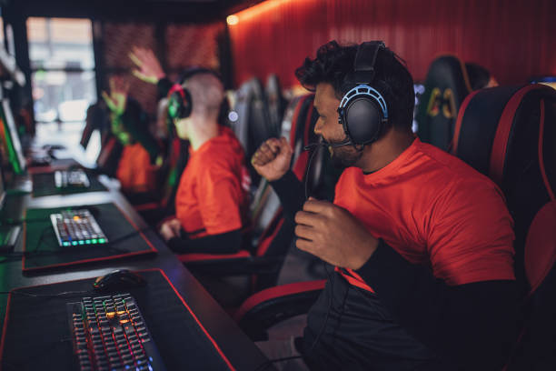 istock Professional eSports Team Celebrating Victory 1840636180