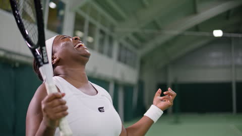 SLO MO Female tennis player being happy after succeeding