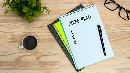 2024 plans wrting on notebook