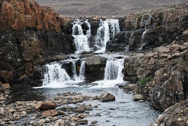 istock Landscape with rocks and a waterfall. 184067395