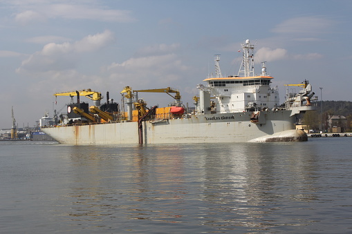 harbor basin with oceangoing freighter