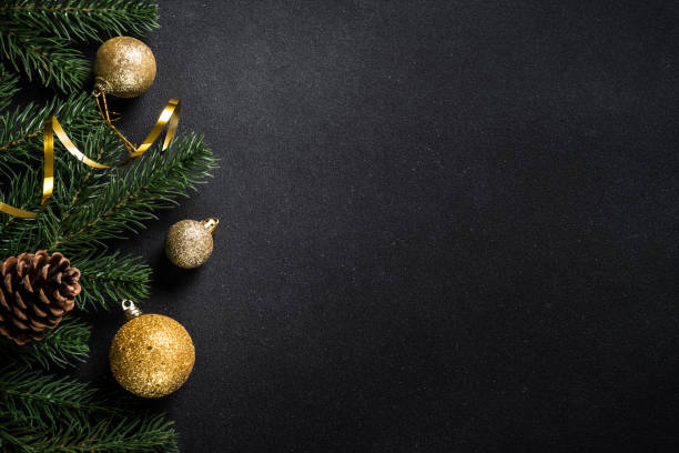 istock Christmas holiday background on black. 1840688692