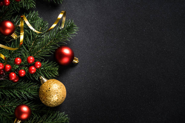 istock Christmas holiday background on black. 1840689206