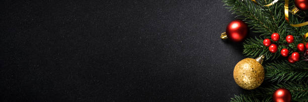 istock Christmas holiday background on black. 1840689210
