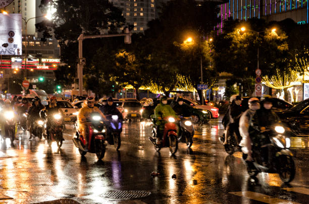 This photograph was taken on November 12, 2023 in Saigon. One of the most striking things about Ho Chi Minh City and Hanoi, the two largest cities in Vietnam, is the number of motorcycles you see on the street. In fact, about 70% of travel in Hanoi and Ho Chi Minh City is done by motorcycle, another 15% by bicycle, and the remaining 15% by car.