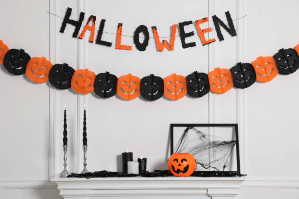istock Different Halloween decor near white wall indoors 1840697121