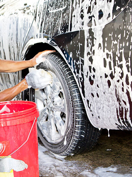 istock Cleaning the wheel on a car 184070502