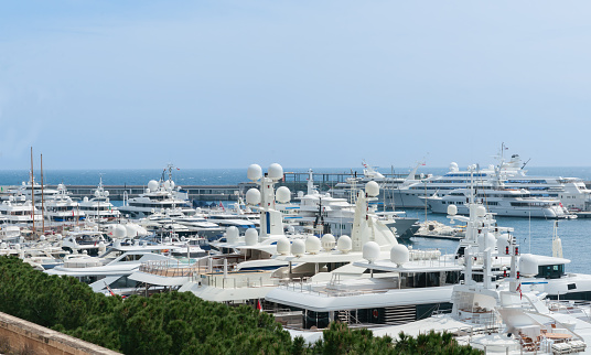 Monaco, Monte Carlo waterfront Marina with many luxury boats moored-