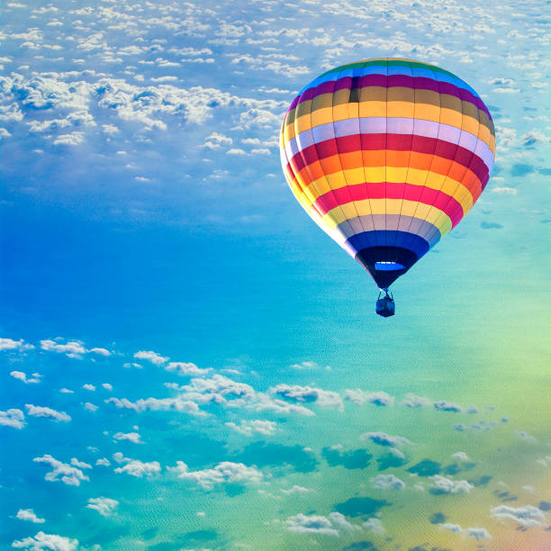 Hot air balloon on sea with cloud