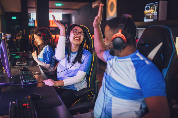 istock Professional eSports Team Celebrating Victory High Five 1840772413