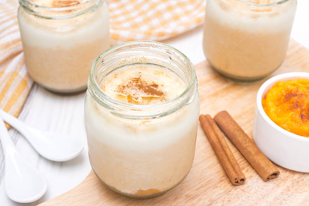 istock yogurt with spiced pumpkin puree in portioned jars 184077695