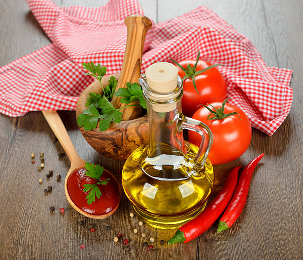 istock Olive oil, vegetables and spices 184077920