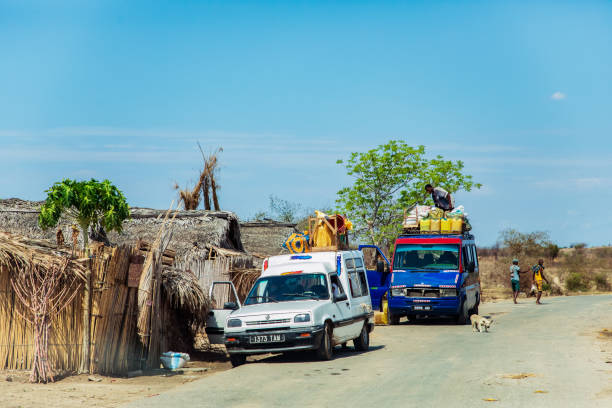 Antsirabe, Madagascar 19 october 2023. Road from Morondava to Antsirabe through village in central Madagascar. traditional Madagascar cargo taxi-minibus loaded to top with things and products