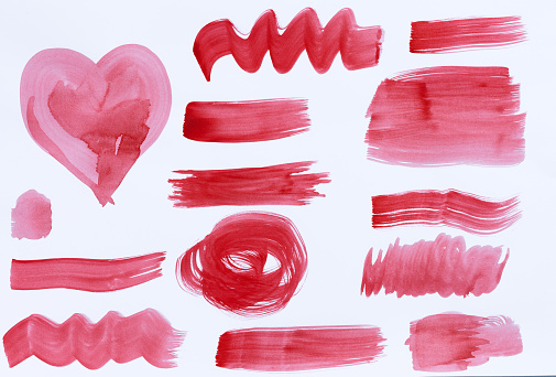 Watercolor brush stroke of red paint, on a white background. Set