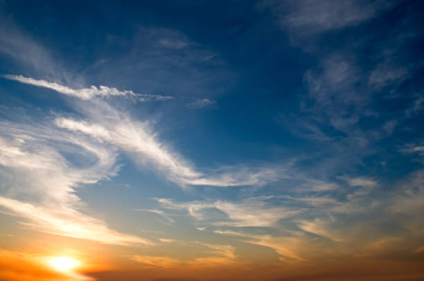 istock Bright sunrise against blue sky. 1840829911