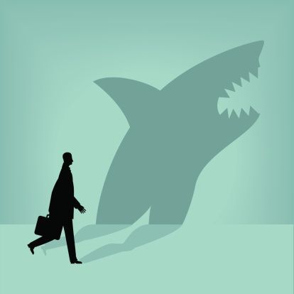 Businessman is a shark in disguise.