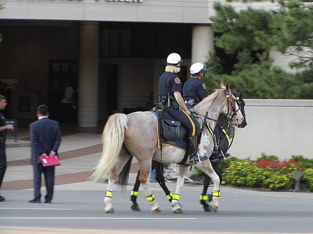 istock city cops on horseback 184084434