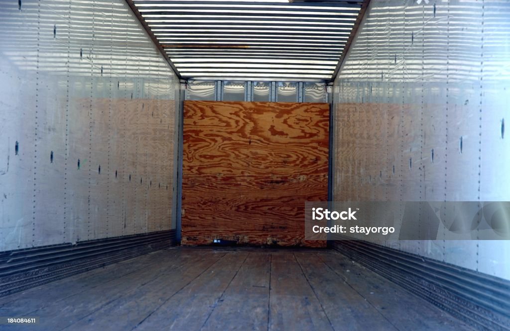 Empty Semi Trailer An empty semi trailer waiting cargo.All my transportation and industry related shots can be seen here: Truck Stock Photo