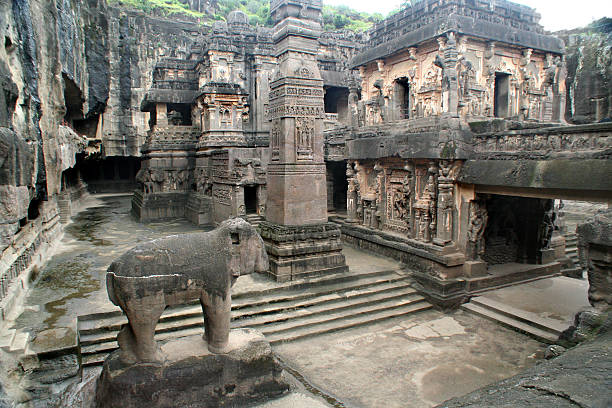 Ellora Caves-Temples Subject: Inside the Ellora Caves in Maharashtra State, India. A series of Buddhist, Hindu, and Jain temples and monasteries carved out of basalt rock jainism photos stock pictures, royalty-free photos & images