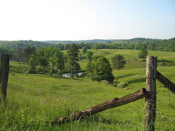 Barbed wire fence closes in the hills and valleys in West Virginia