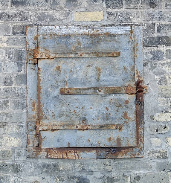 istock Metal Door brick wall. 184085079