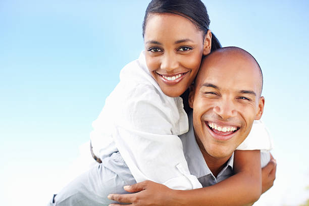 istock Playful couple enjoying outdoors 184085776