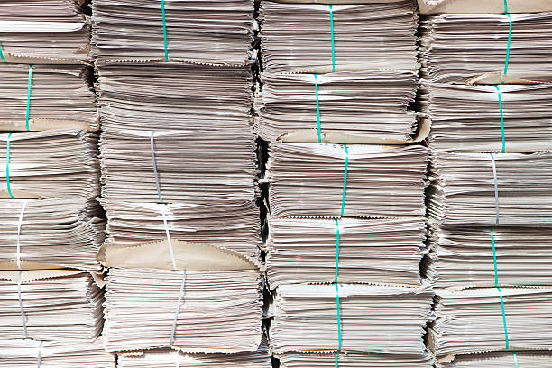 istock Pile of newspapers 184085989