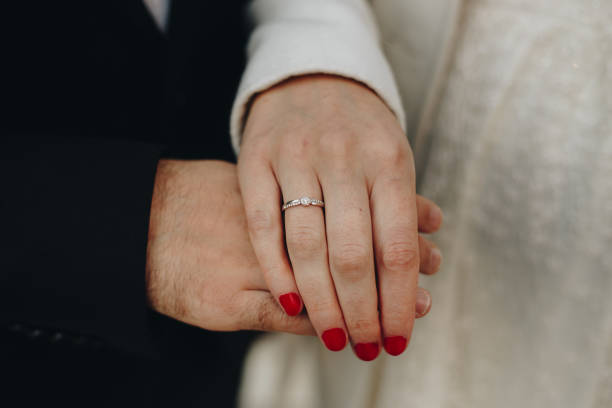 istock Holding hands with ring stock photo 1840861147