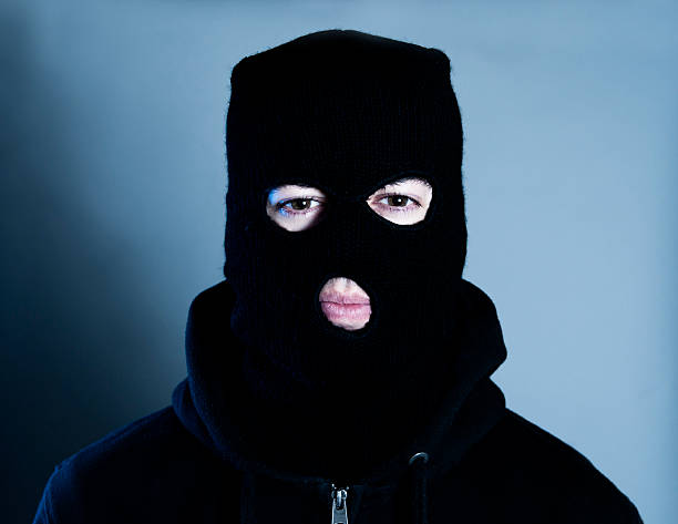 istock Terrorist or burglar wears a mask 184086593