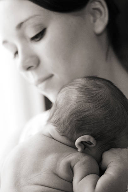 istock Backlit Mother and Newborn 184086614