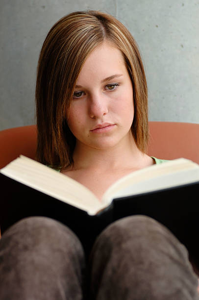 istock Beautiful Girl Reading 184086945