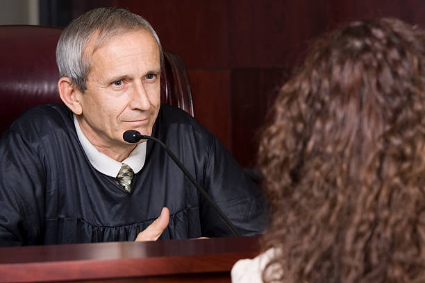 istock US Judicial System-judge listening 184087276