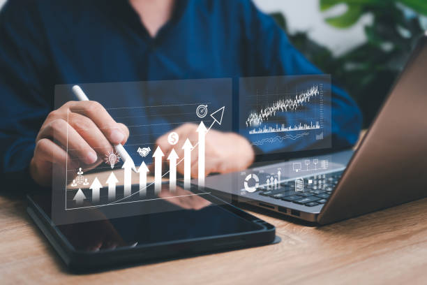 istock Business growth, Financial analysis of digital augmented reality graphics profitability, Businessman use tablets management effective financial data long-term target and analyzing company growth 1840877150
