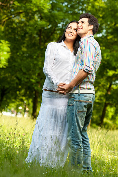 istock Loving Young Couple Standing In The Park 184087822