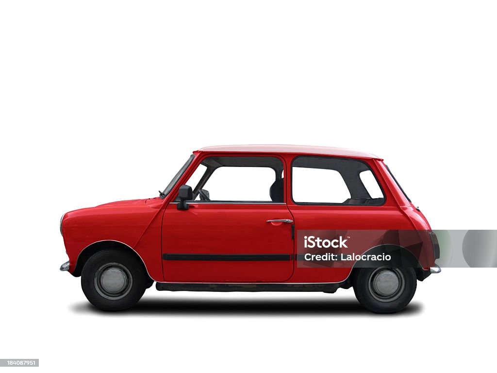 A red Mini Cooper from the 1960s Mini Cooper, side view. Red with white roof. Car Stock Photo