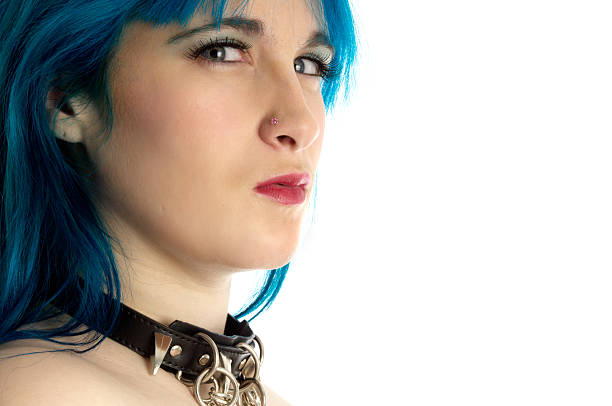 istock Semi-profile of blue-haired model in collar. 184089452