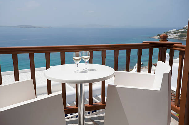 istock Two glasses of wine on a balcony 184089615