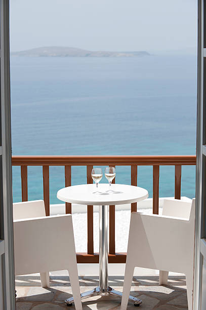 istock Two glasses of wine on a balcony 184089620