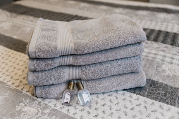 istock A stack of clean white towels in the shower room 1840897346
