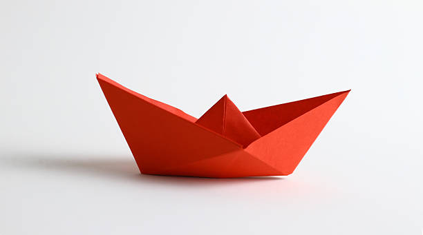 istock Red origami boat 184090056