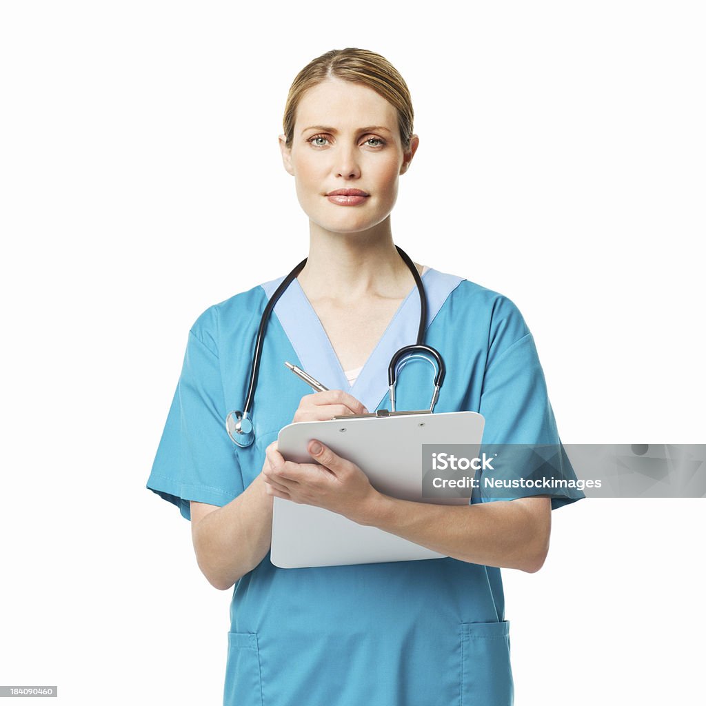 Enfermeira escrevendo sobre uma prancheta-isolado - Foto de stock de 20 Anos royalty-free