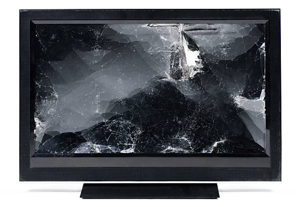 Smashed up flat screen HDTV. A modern flat screen LED high definition television set that has been smashed and jumped on. broken flat screen stock pictures, royalty-free photos & images