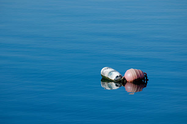 mar e mate - buoy anchored sea wave - fotografias e filmes do acervo