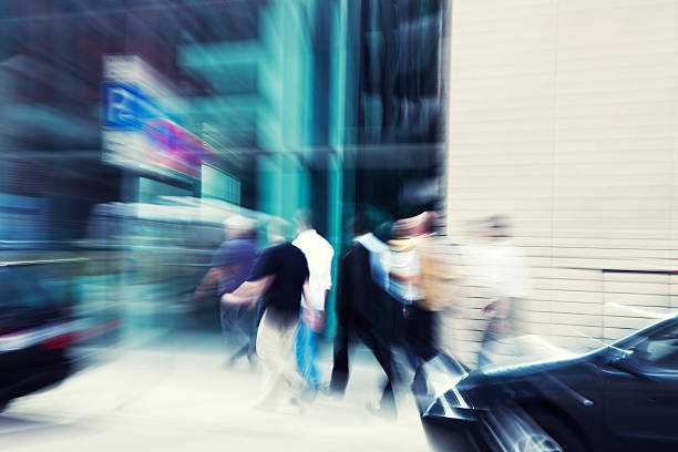 istock Blurred Office Workers Walking Past Business Building 184091461